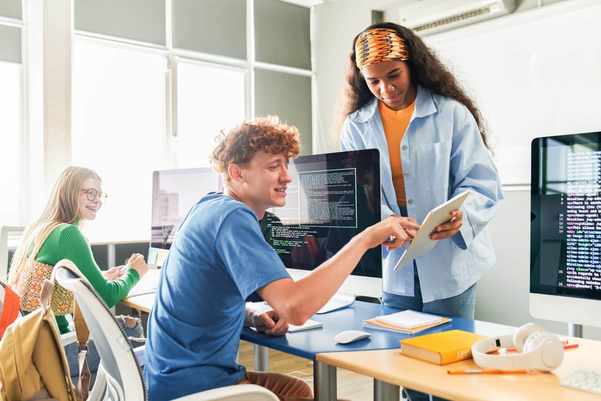 Students learning IT at school