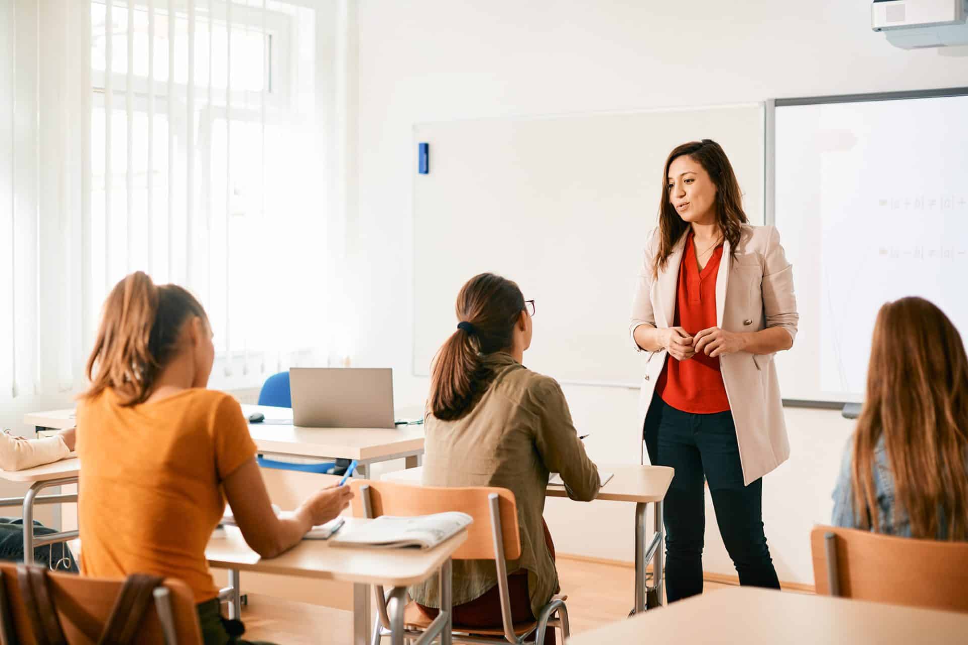 Teacher instructing a class.