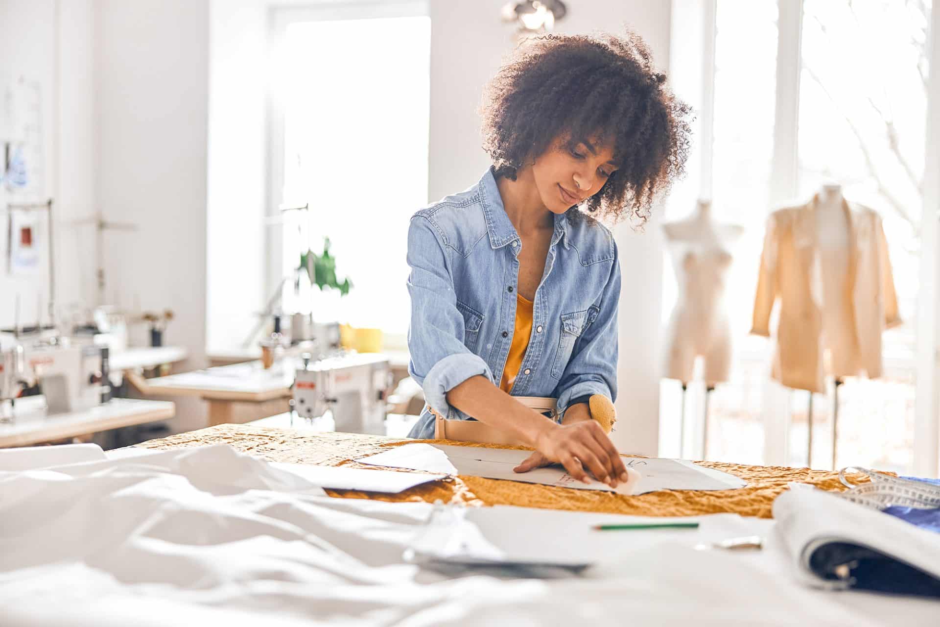 Fashion designer in studio.