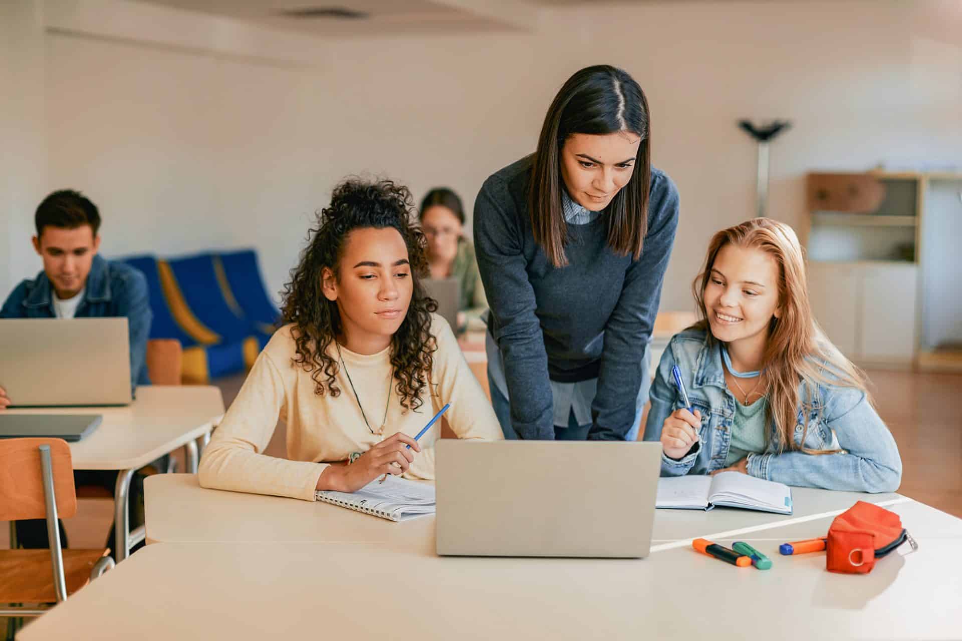 Teacher instructing students.