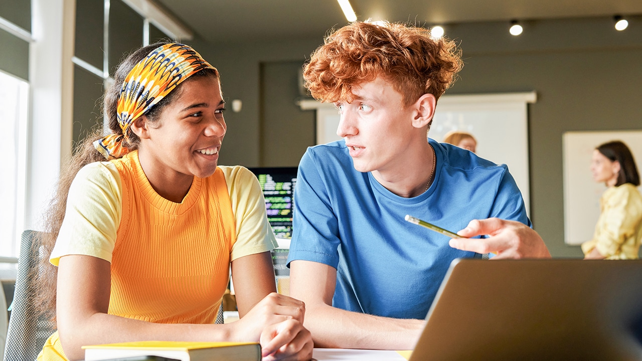 2 students working in classroom