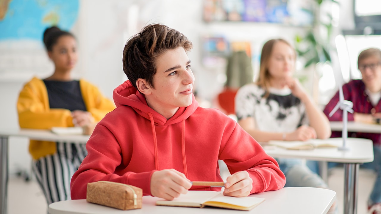 student sitting in classroom