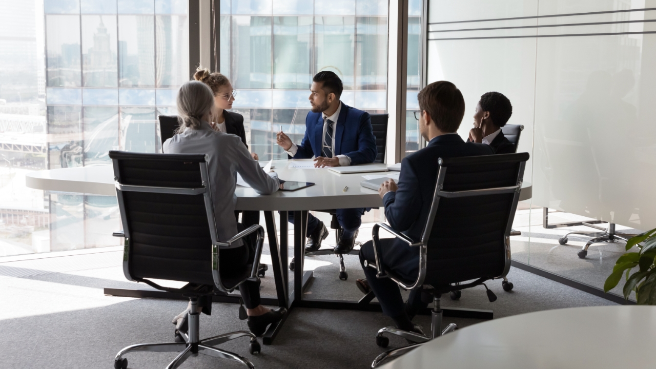 Workers at office table