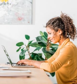 Women using laptop at desk